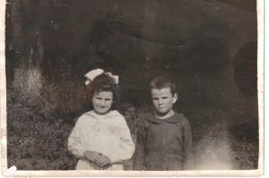 Agnes, with her younger brother, Frank McMahon -- ca 1920